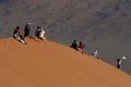 People on dune, Namibia