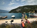 people in talloires bay on lake annecy Royalty Free Stock Photo