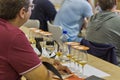 People taste whisky at Whisky Dram Festival in Kiev, Uktaine