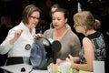 People tasting coffee at the Nescafe Dolce Gusto product launch event in Johannesburg, South Africa