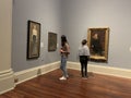 People at Tate Britain art museum on Millbank in the City of Westminster in London