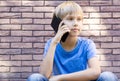 People, technology and communication concept. Child talking on cell phone Royalty Free Stock Photo