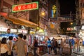 People at the Temple Street Night Market in Hong Kong at night