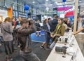 People testing professional photographic cameras on Sony booth. Kyiv, Ukraine