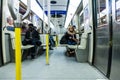 People texting inside the Montreal Metro Royalty Free Stock Photo