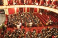 People in theatre hall at graduation show for collage. National Theatre in Iasi, Romania