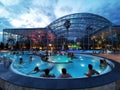 People in thermal pool outdoor at Balotesti, Romania. Therme Bucharest. Royalty Free Stock Photo