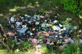 People throw away plastic bottles, bags and food waste, leave trash on the street after themselves. The Royalty Free Stock Photo