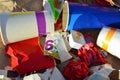 People throw coffee cups on snow. A pile of abandoned garbage on the street. Scattered food waste, cans of cola, beverage, fast