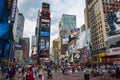 People at the Times Square in the city of New York, USA. Times square is one of the most famous landmarks in the world. Royalty Free Stock Photo