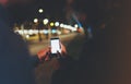 People together pointing finger on screen smartphone on background bokeh light in night atmospheric city, group adult hipsters Royalty Free Stock Photo