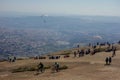 People on top of Pedra Grande, a stone hill in Atibaia, Sao Paulo, Brazil. huge rock formation of natural monument, paraglider lau