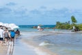 People tourists on the beach of Morro de Sao Paulo in the city of Cairu, Brazil