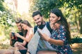 People tourists searching for direction using paper map Royalty Free Stock Photo