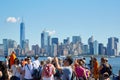 People and tourists shooting photos and looking at New York city skyline Royalty Free Stock Photo