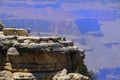 People Tourists on top of a Cliff taking selfies at Grand Canyon Arizona USA Amazing View Red Rock Cliffs and Vistas