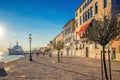 People tourists are walking down embankment promenade Fondamenta Zattere