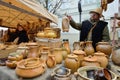 People trades typical lithuanian clay pots