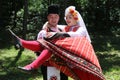 People in traditional authentic folklore costume a meadow near Vratsa, Bulgaria