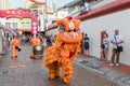 People in traditional costume perform the Chinese lion dance, Chinatown, Singapore Royalty Free Stock Photo