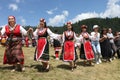 People in traditional folk costume of famous Rozhen folklore festival in Bulgaria Royalty Free Stock Photo