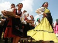 People in traditional folk costume of The National Folklore Fair in Koprivshtica Royalty Free Stock Photo