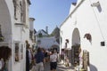 People in the traditional streets of Alberobello