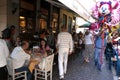 People at a traditional taverna in the historic city of Athens