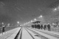 People in traffic through snow in Bucharest, Romania