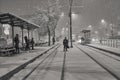 People in traffic through snow in Bucharest, Romania, January 20, 2024