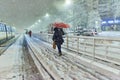 People in traffic through snow in Bucharest, Romania, January 20, 2024