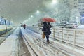 People in traffic through snow in Bucharest, Romania, January 20, 2024