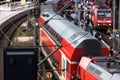people and trains of the deutsche bahn on hamburg central station in germany blur