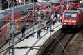 people and trains of the deutsche bahn on hamburg central station in germany blur