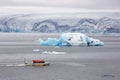 People travel on a special amphibian boat on the ice lagoon in Iceland Royalty Free Stock Photo