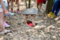 People travel and trying to play entering tunnel at Cu Chi Tunne Royalty Free Stock Photo