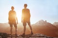 Travel, people traveling, hiking in mountains, couple of hikers looking at panoramic landscape Royalty Free Stock Photo