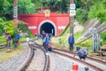 People or traveller enjoy with photograph at Train station with Tunnel cave and railroad tracks at KhunTan railway station in Lamp