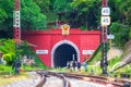 People or traveller enjoy with photograph at Train station with Tunnel cave and railroad tracks at KhunTan railway station in Lamp