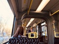 People travelling in a tram in Berlin city Germany