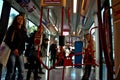 People travelling in a trolley car 8