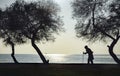 People and Trees, Elderly woman walking on a cane Royalty Free Stock Photo