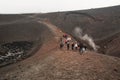 People trekking on Etna volcano, Sicily.