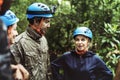 People Trekking in a forest