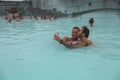 People, two men, bathing in Blue Lagoon in Iceland Royalty Free Stock Photo