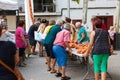People tying tomatoes together to form the hanging bunches during Tomato `Ramellet` Night Fair in Maria de la Salut, Mallorca, S Royalty Free Stock Photo
