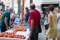 People tying tomatoes together to form the hanging bunches during Tomato `Ramellet` Night Fair in Maria de la Salut, Mallorca, S Royalty Free Stock Photo