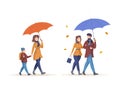 People with umbrellas walking under rain in autumn Royalty Free Stock Photo