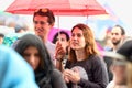 People with umbrellas watching a concert under the rain at Heineken Primavera Sound 2014 Festival Royalty Free Stock Photo