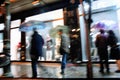 People under umbrella walking in the rain. Royalty Free Stock Photo